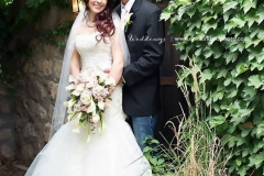 1_Ashleys-half-up-and-loosely-curled-wedding-day-hair-and-brown-toned-smokey-eye-with-mid-toned-lip-wedding-day-makeup