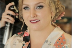 Alyssa-with-wedding-day-updo-and-blue-and-grey-toned-eye-with-red-lip-wedding-day-makeup