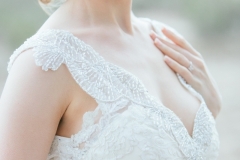 Eve-bridals-with-vintage-hairstyle-and-1920s-grey-smokey-eye-and-red-lip-bridal-makeup